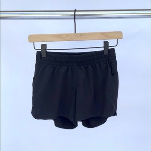 Athleta girl Allyson Felix record breaker shorts.